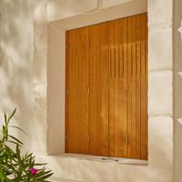 Persienne pliante en pin brut sur mesure Nancy - Fenêtres